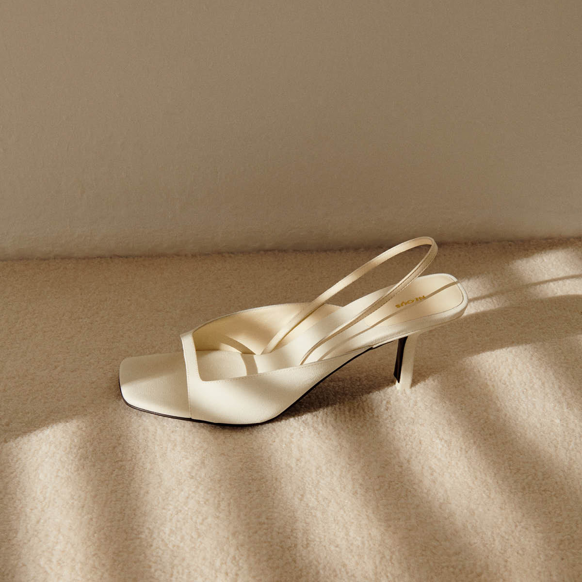 kamui-cady-leather-slingback-cream